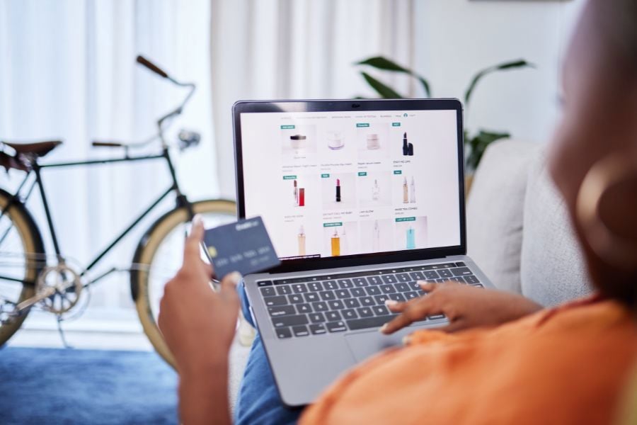 The State of E-commerce Fulfillment A consumer shops online for products from their living room.