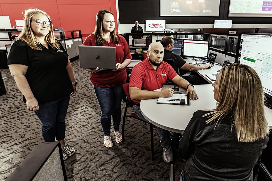 Ryder fleet risk and compliance team collaborating Ryder fleet risk and compliance team collaborating