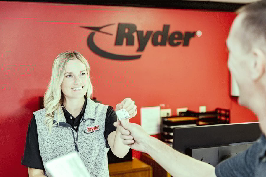 Ryder rental agent passing off truck keys to a customer Ryder rental agent passing off truck keys to a customer