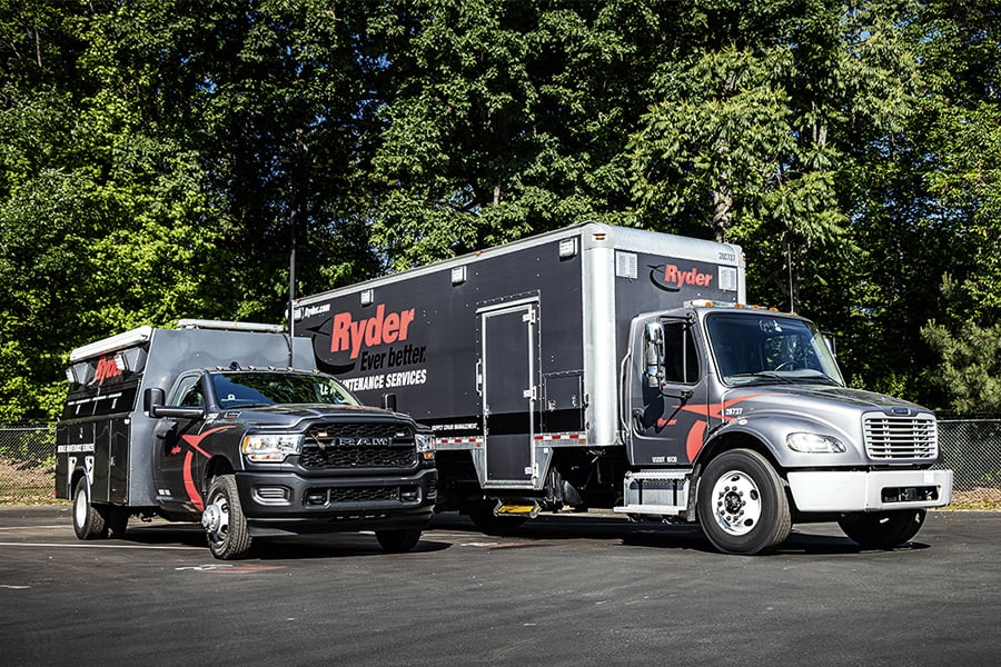 Two Ryder mobile maintenance trucks lined up Two Ryder mobile maintenance trucks lined up