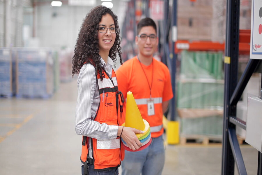 two employees at a warehouse center