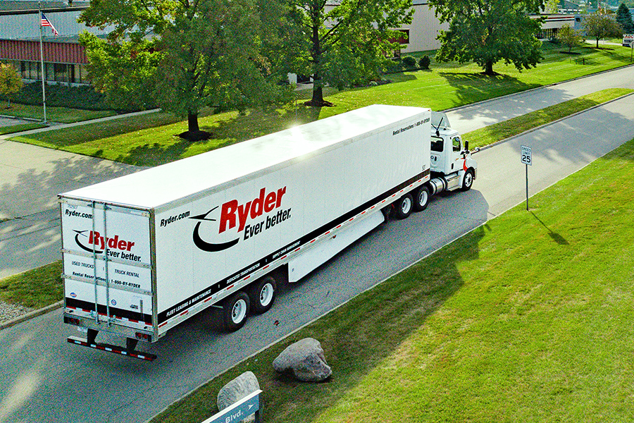 A semi truck that is part of the Ryder fleet A semi truck that is part of the Ryder fleet