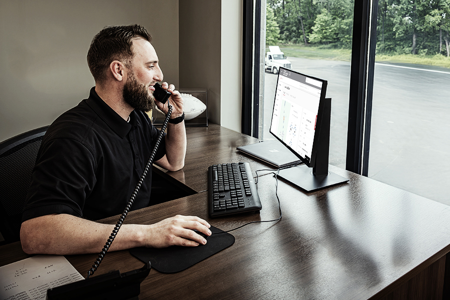 A fleet manager using Rydergyde to manage and track their fleet of vehicles A fleet manager using Rydergyde to manage and track their fleet of vehicles