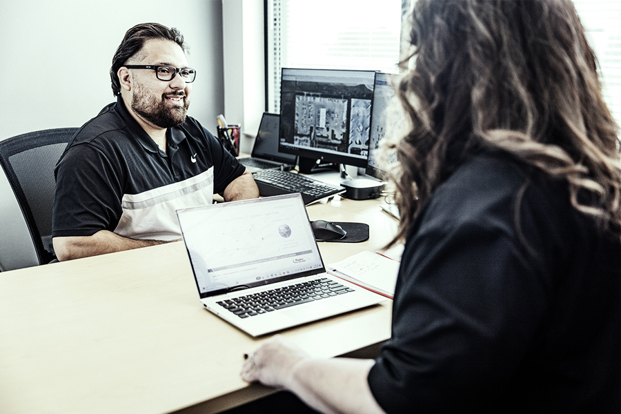 A Ryder employee integrating Ryder technology with a customer's business software A Ryder employee integrating Ryder technology with a customer's business software