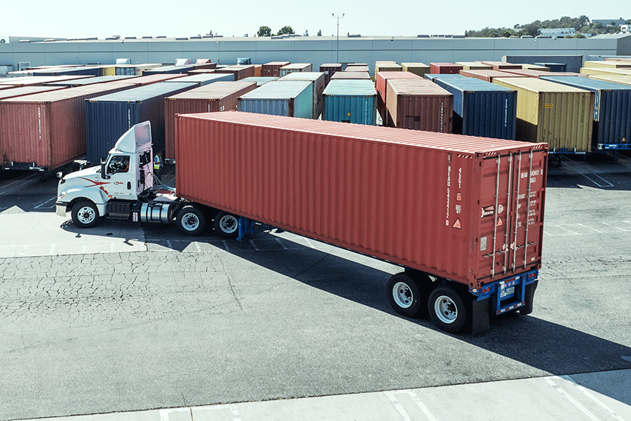 drop and hook truck dropping off a full trailer