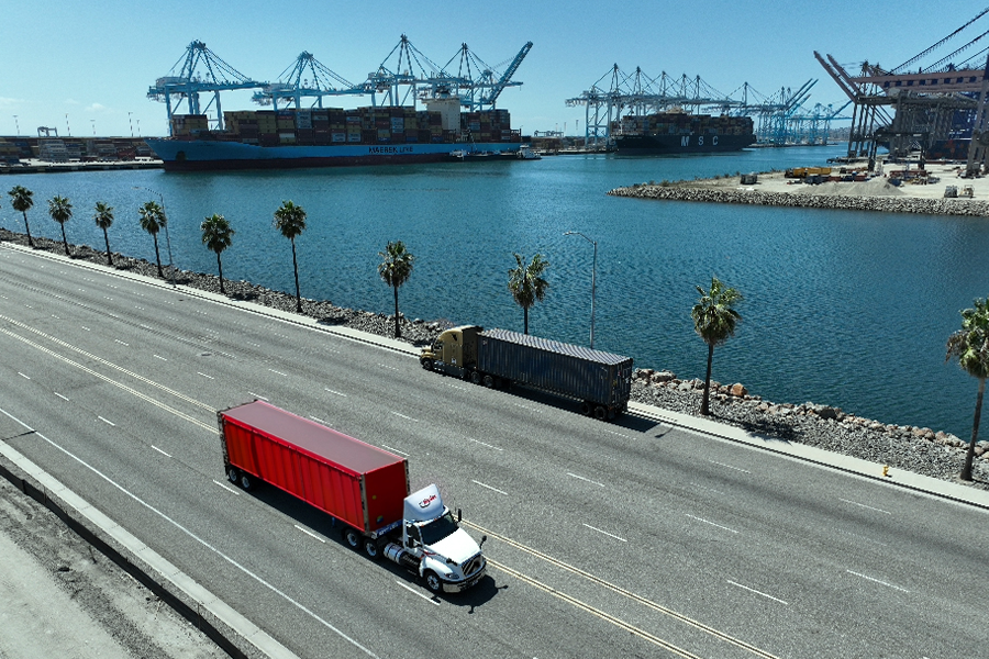 intermodal freight trucks driving on road