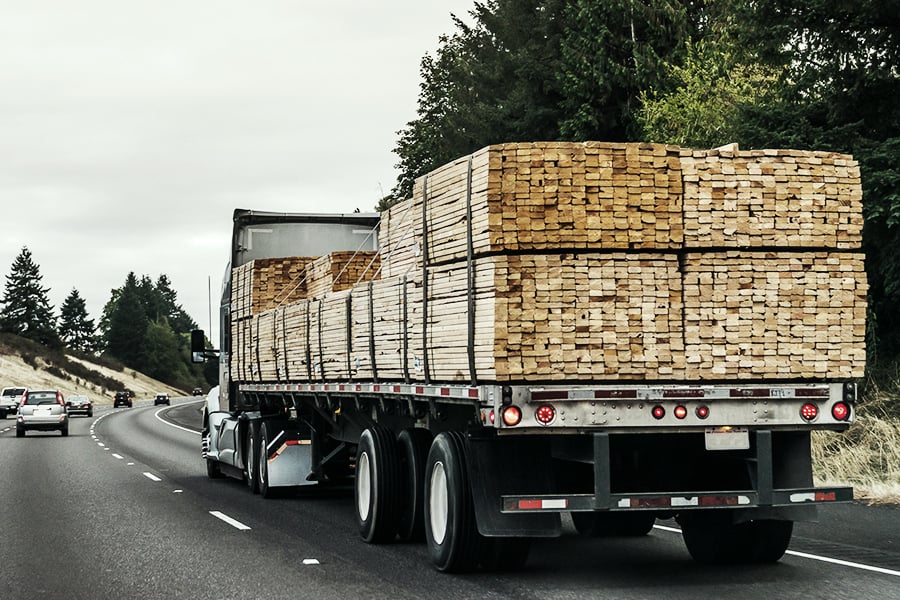 Truck transporting lumber Truck transporting lumber